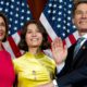 Photo of Nancy Pelosi and Rep. Tom Malinowski during a swearing-in ceremony