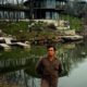 Photo of Johnny Cash in front of his Hendersonville home in 1969