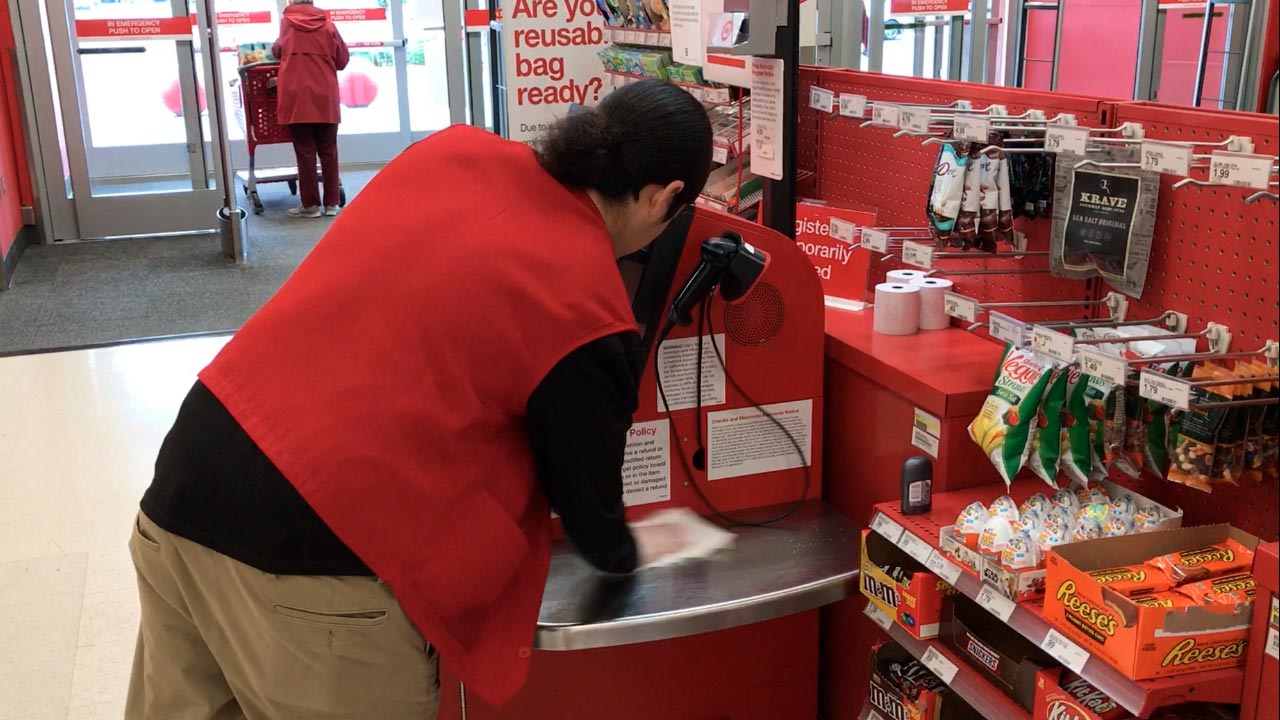 Northwest Fresno Target employee cleans register