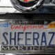 Photo of an SUV with a personalized license plate