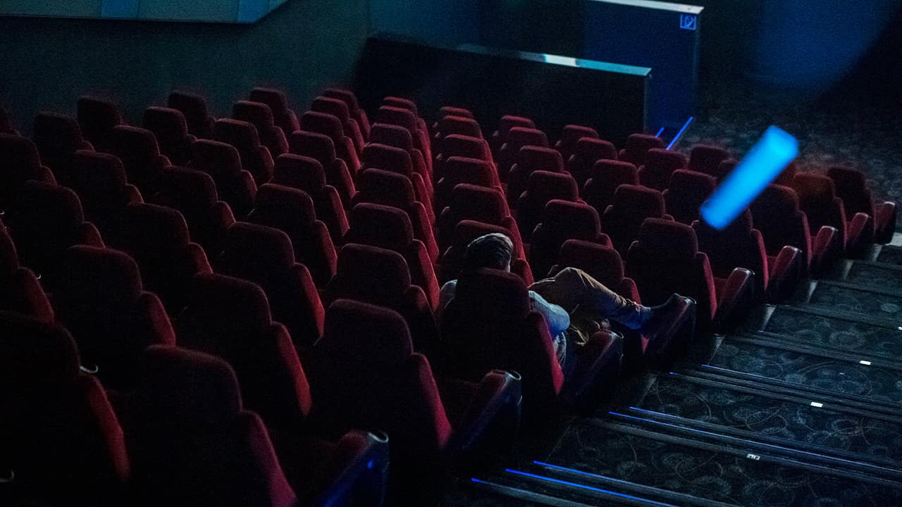 Photo of a man in a movie theater