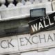 Photo of Wall Street sign in front of the NYSE