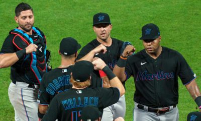 Image of Miami Marlins celebrating a victory in violation of MLB's coronavirus protocols