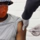 Photo of a person getting a vaccine